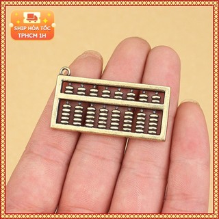 Tượng nhỏ bằng đồng kiểu dáng hình bàn tính cổ