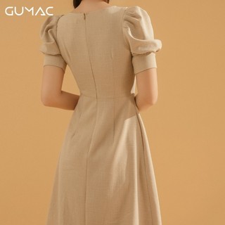 Đầm vạt đắp đính nút DA711 GUMAC