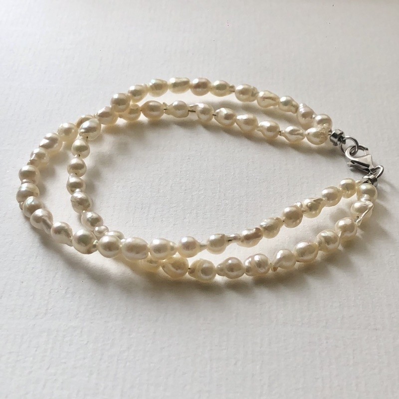 Lắc tay trai Akoya dị mặn