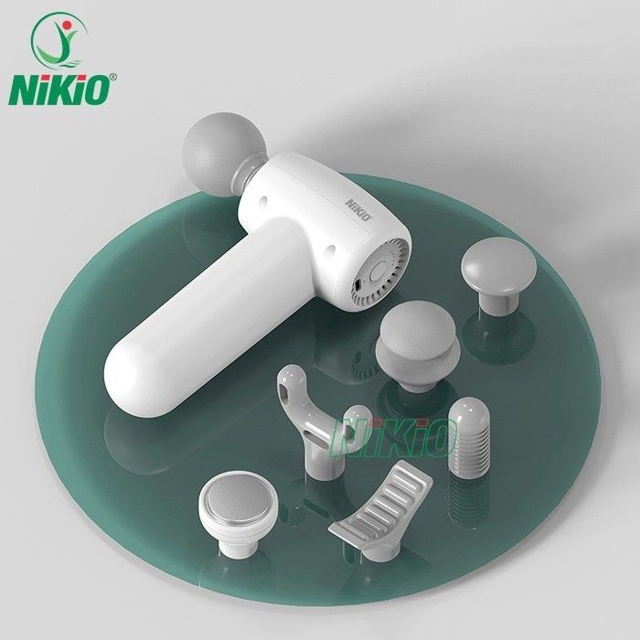 Súng massage cầm tay mini Nikio NK-175 - 7 đầu, có đầu nóng - Màu trắng