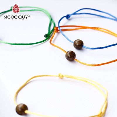 Vòng tay trầm tốc thắt dây đỏ may mắn, vòng trầm hương - Ngọc Quý