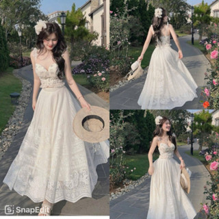 Bộ váy nữ kiểu dáng xòe, áo hai dây hoa và chân váy dài, thanh lịch cho nàng đi biển và chụp ảnh thật đáng yêu