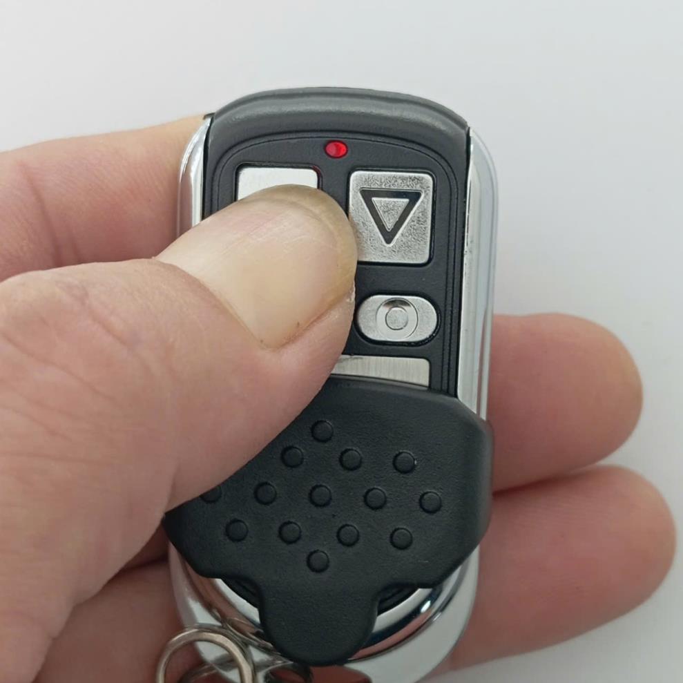 Điều khiển cửa cuốn BOSSDOOR Tân Trường Sơn 336 mhz mã nhảy chống sao chép