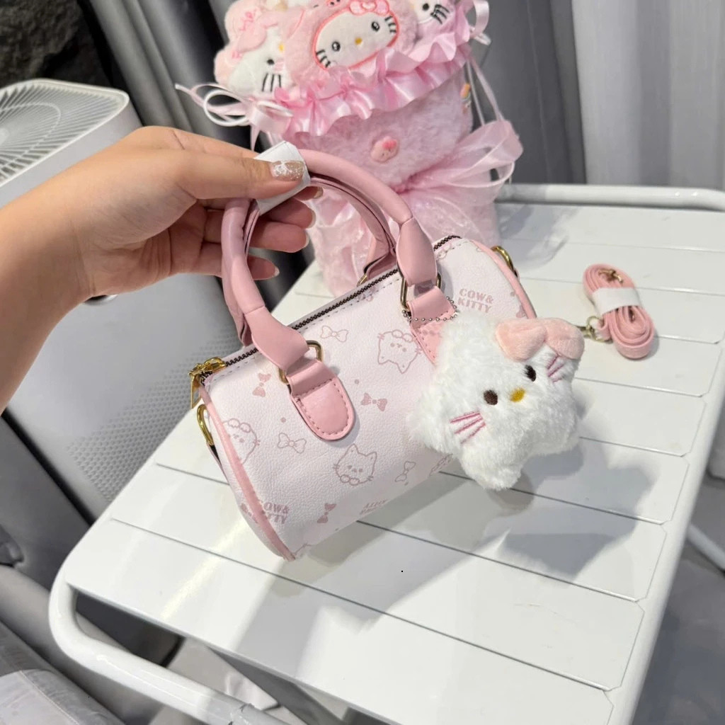 Túi đeo vai nữ YUMI túi trống xách tay đeo chéo size 19cm kèm móc treo dễ thương MK1341