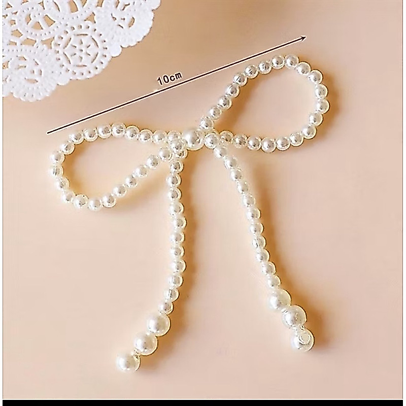 Nơ ngọc trang trí bánh kem P52