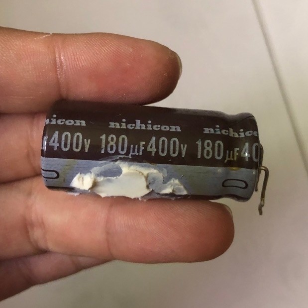 (Tháo nguồn meanwell) Tụ nichicon 400v 180uF tháo máy chân gập như hình