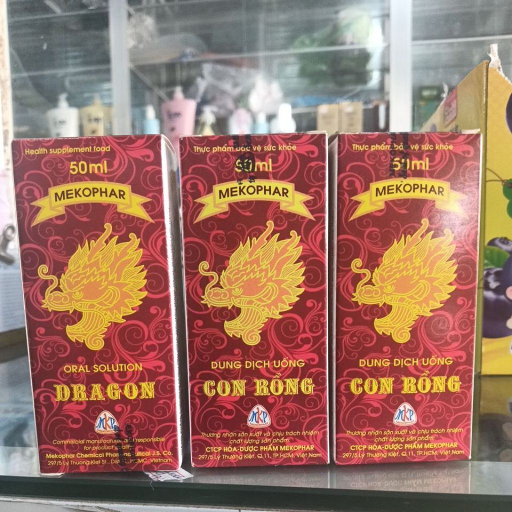 dung dịch uống con rồng mekophar ( hổ trợ lạnh bụng, ăn không tiêu, chướng bụng ).