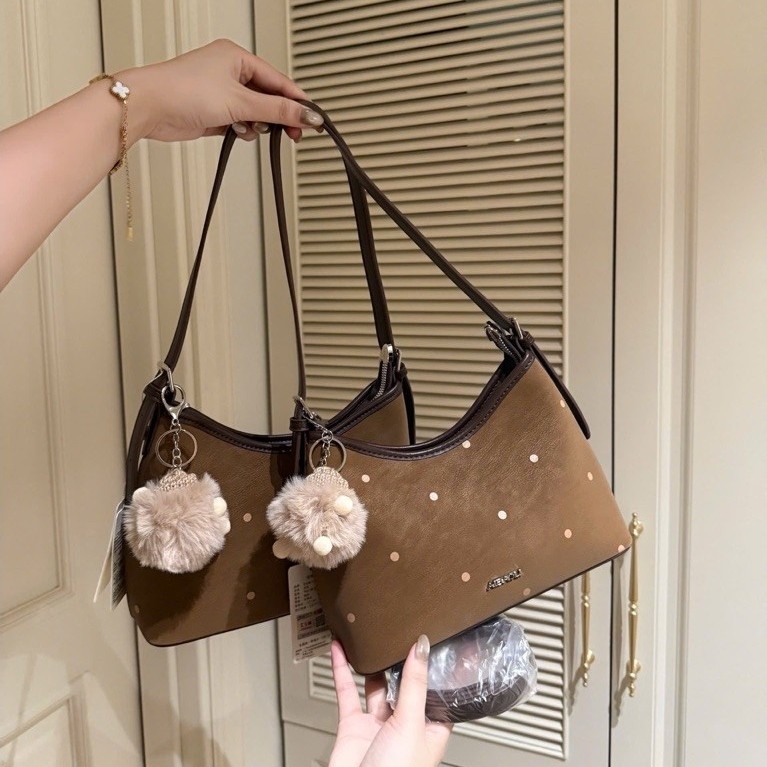 Túi Chấm Bi size 25cm da vân tặng kèm charm Bông