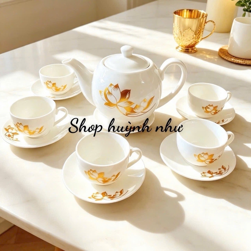 [SHOP 3K MARTS II]Bộ ấm trà hình hoa siêu đẹp1 Bộ gồm 1 ấm trà , 6 ly kèm 7 cái đĩa lót . Sứ tráng m