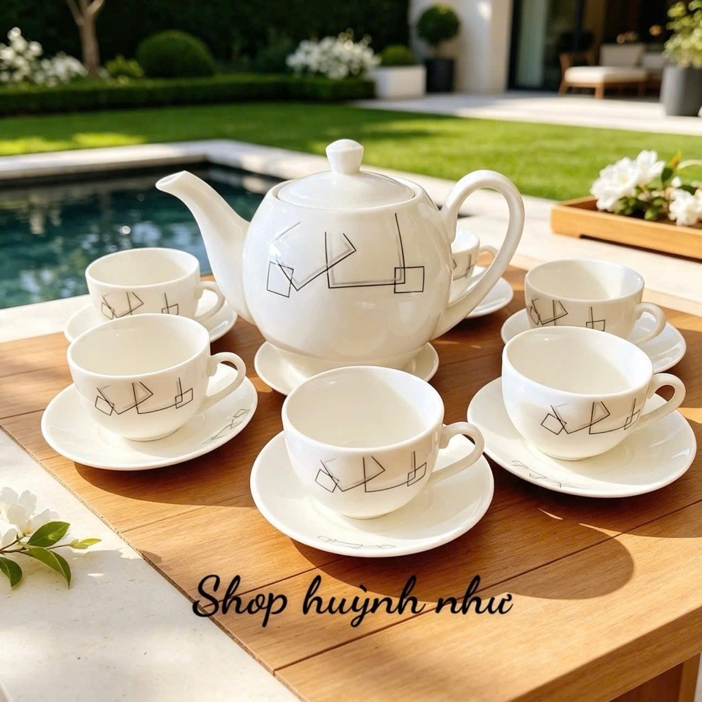 [SHOP 3K MARTS]<Bộ ấm trà hình hoa sen đẹp1 Bộ gồm 1 ấm trà , 6 ly kèm 7 cái đĩa lót . Sứ tráng men 