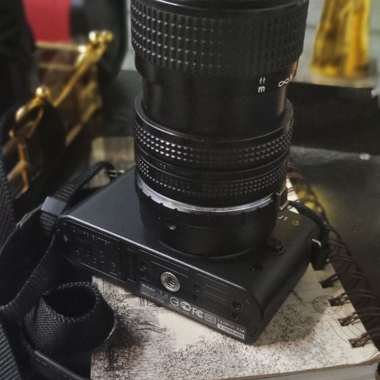 Máy ảnh Nikon 1 J1 Black kèm Lens đa dụng 35-70