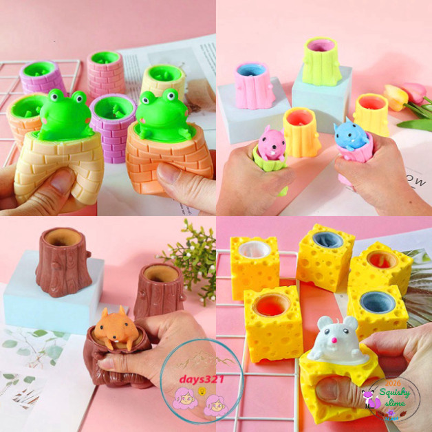Sản phẩm ẾCH NGỒI ĐÁY GIẾNG quishy hình gốc cây, đồ chơi bóp tay mềm mịn dễ thương, giúp giảm stress