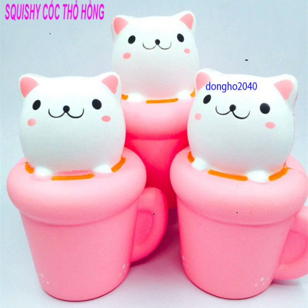Squishy MÈO HỒNG nằm trong cốc squishy cốc thỏ hồng dễ thương ngộ nghĩnh