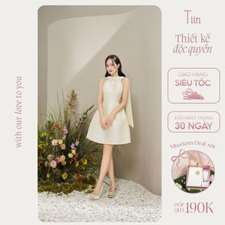 TIINSTORE Váy cổ yếm sang chảnh thiết kế vạt lưng kèm hoa cài màu kem đầm kiểu nữ tiểu thư dự tiệc sang trọng V0D1039