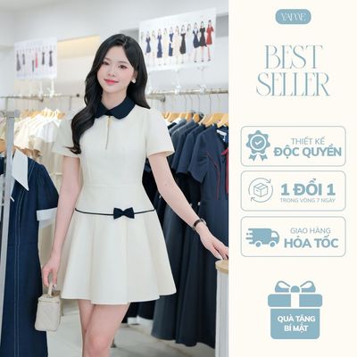 Váy Nữ Dáng Xòe YAME Xếp Ly Nhẹ Ngắn Tay Khóa Ngực Màu Kem Phối Đen Đính Nơ Tiểu Thư YV691