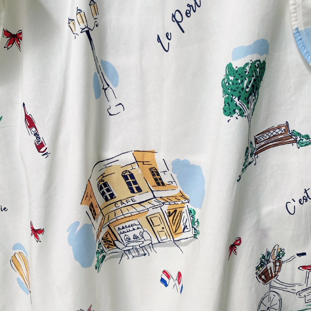 Đầm bé gái nơ eo họa tiết Paris và lá cam