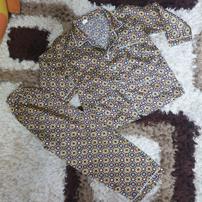 Thanh lý bộ vải phi Pizama cho bé trai dưới 35 ký .