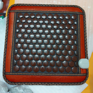 Thảm đá nóng trị liệu đau lưng