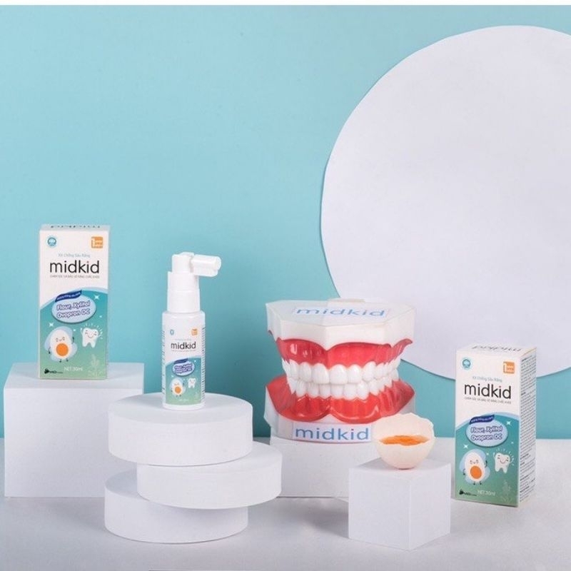 XỊT SÂU RĂNG MIDKID CHINH HANG