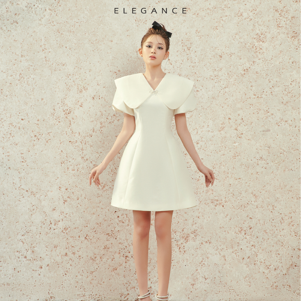 Váy Nelly Dress màu trắng thiết kế vai bèo