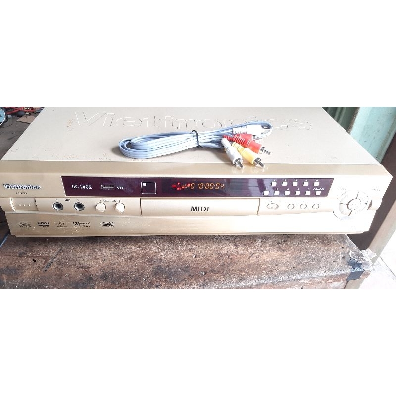 Đầu Đĩa KARAOKE MIDI Viettronics iK-1402 đầu cũ màu xám vàng lợt như hình,chú ý không còn remote nhé,ấn phím trên đầu ok
