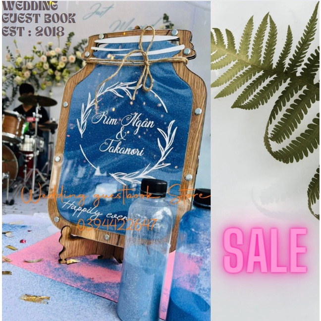 Chai rót cát dùng cho nghi thước tiệc cưới  và Ví da khắc tên theo yêu cầu