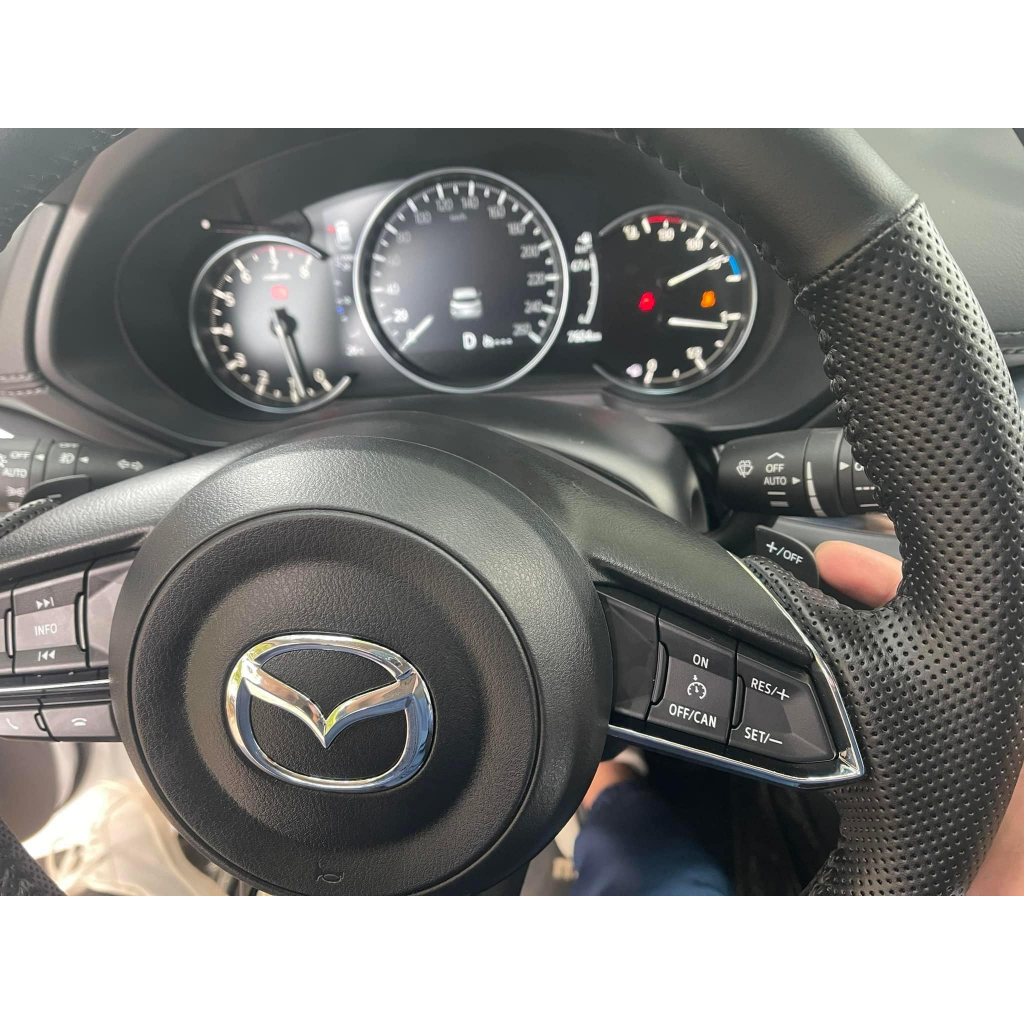 Lẫy chuyển số trên vô lăng cho xe Mazda