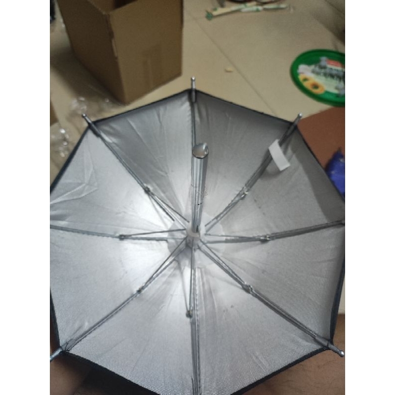 Dù mini che nắng và chống thấm cho điện thoại trên giá đỡ