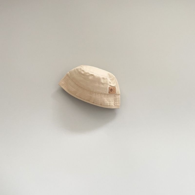 Mũ cụp vành gắn tag mặt cười cho bé, mũ cụp vành cho bé