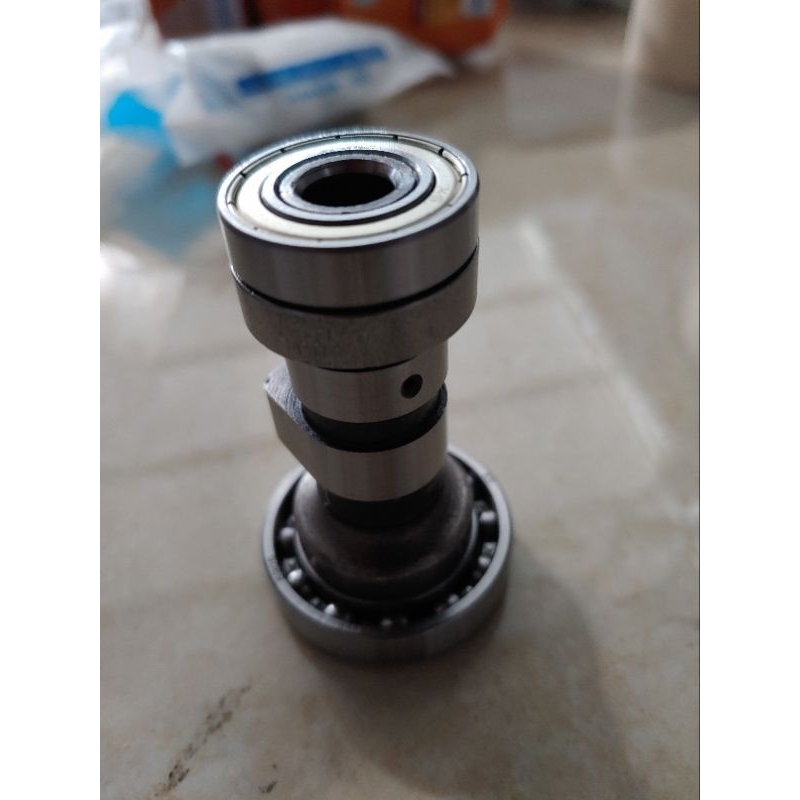 Trục cam Hãng SYM lắp chung Dream Việt.