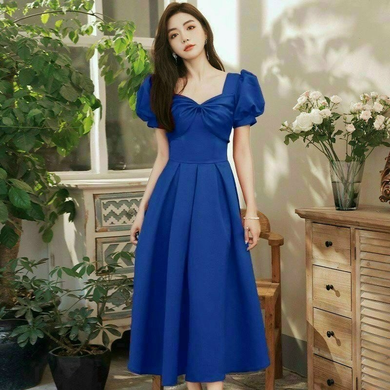 Đầm xòe công sở dự tiệc, cổ tứ giác, tay ngắn phồng, nơ trước ngực, tùng xòe xếp li, dây kéo sau lưng