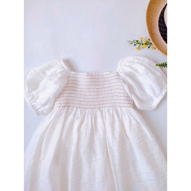 Váy đầm trắng, ngực nhún Smock, tay búp cho bé gái 7kg - 25kg