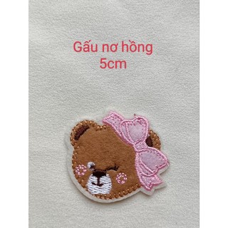 ticker ủi áo bé gái