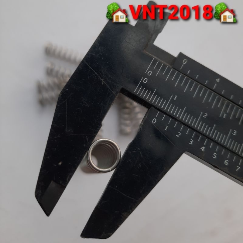 Lò xo nén inox304 phi 9mm sợi 1mm