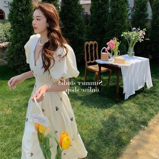 Váy Hoa Linen Cổ V Tay Bồng Thắt Nơ Sau Hàng 2 Lớp