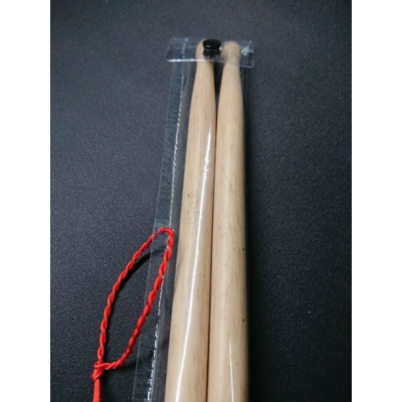 Dùi trống khắc theo yêu cầu khắc theo mẫu tên Minh Khôi