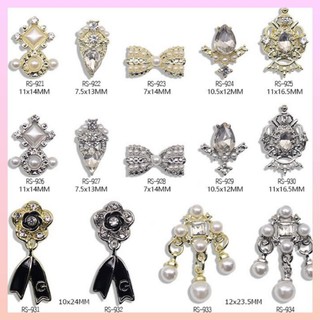 Charm hoa hồng xích,nơ xích trang trí móng mới