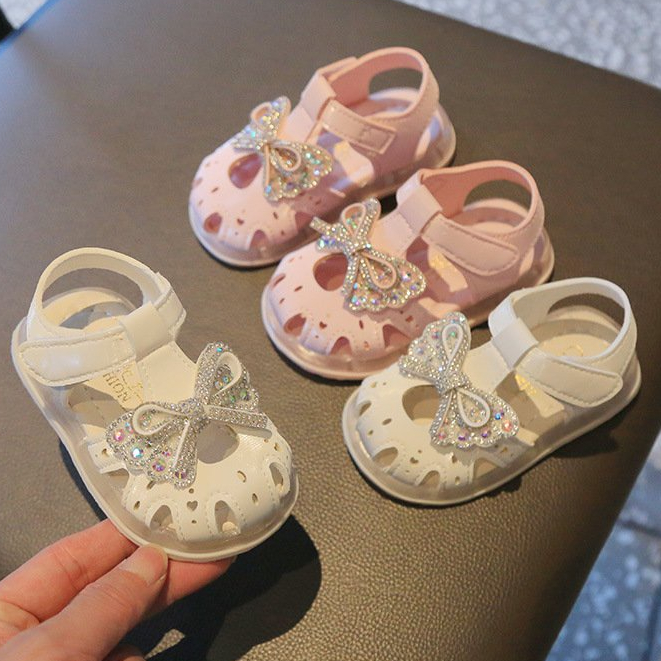 Sandal Tập Đi Cho Bé Gái 0-4 Tuổi Hoạ Tiết Thời Trang Gắn Nơ Đế Chống Trơn Trượt Siêu Xinh
