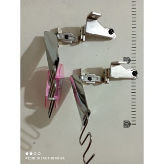 Cữ tra cổ áo bằng máy vắt sổ