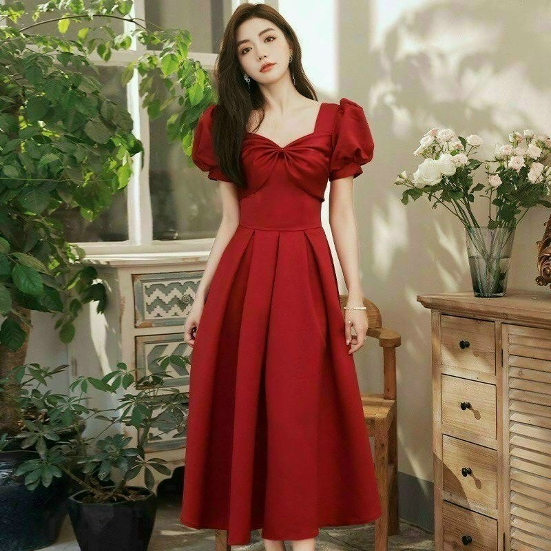 Đầm xòe công sở dự tiệc, cổ tứ giác, tay ngắn phồng, nơ trước ngực, tùng xòe xếp li, dây kéo sau lưng