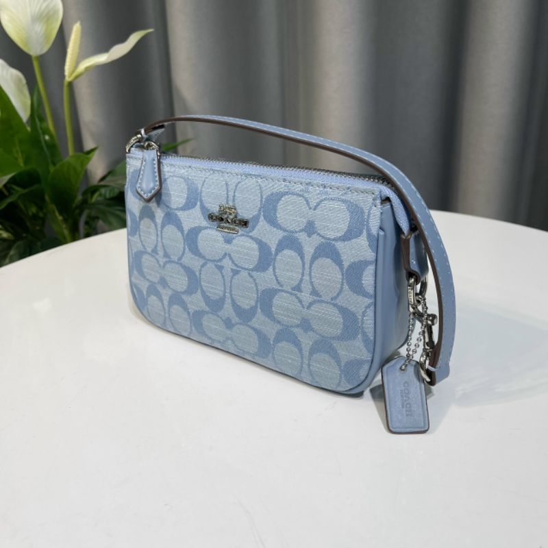 Túi Coac*h Nolita 19 kẹp nách sang trọng