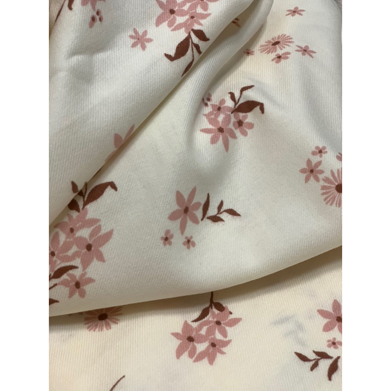 Kaki hàng áo hoa cam