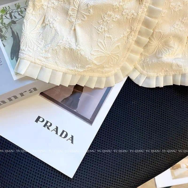 Áo sơ mi hoa nổi cúc bọc