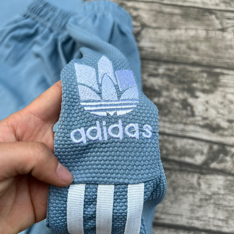 Bộ thể thao cộc tay nam, bộ xốp nam thêu logo cao cấp chất liệu vải xốp bóng co dãn thấm hút mồ hôi tốt