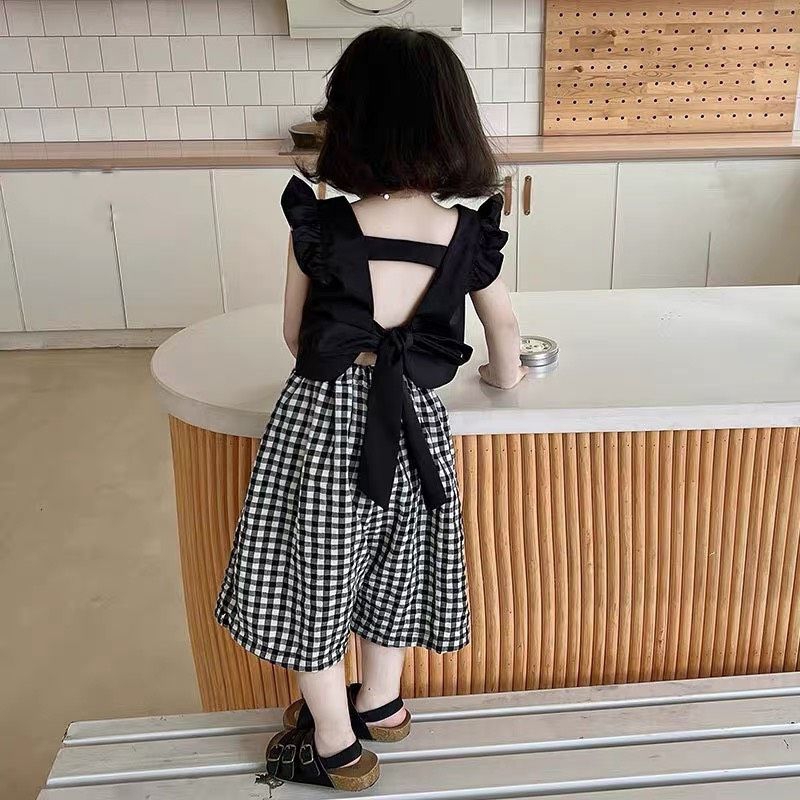 Bộ  áo cánh tiên nơ lưng kèm quần xuông caro tiểu thư bé gái