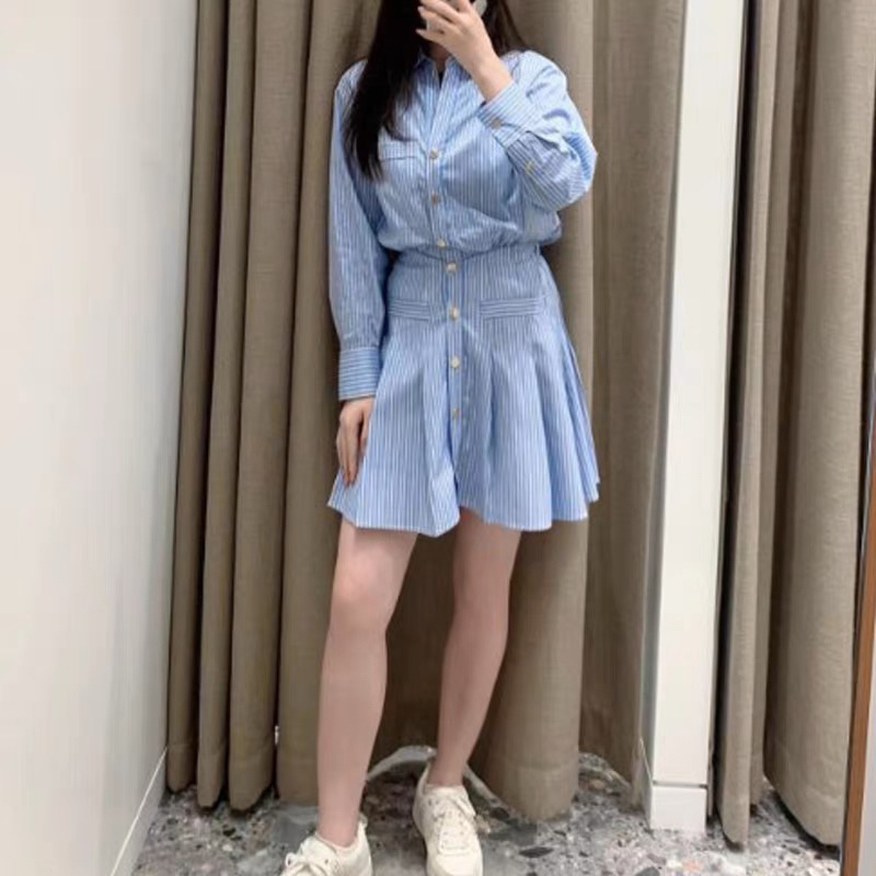 Váy sơ mi kẻ xếp li chiết eo phối cúc đồng