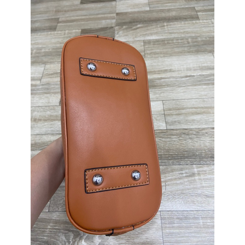 Túi si da tăm LV hến