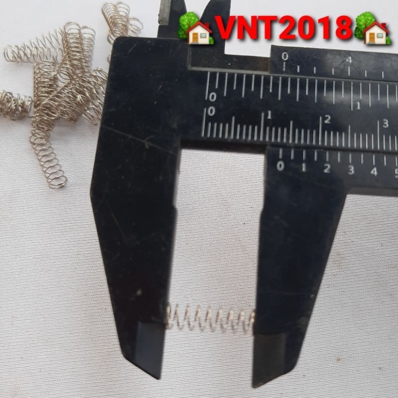 Lò xo nén inox phi 4x14mm