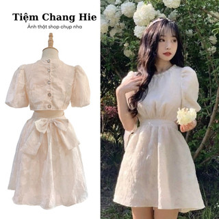 Đầm công chúa hoa nổi đính đá viền cổ cutout nơ hở lưng | Váy kem hoa đi tiệc, du lịch, kỉ yếu | Tiệm