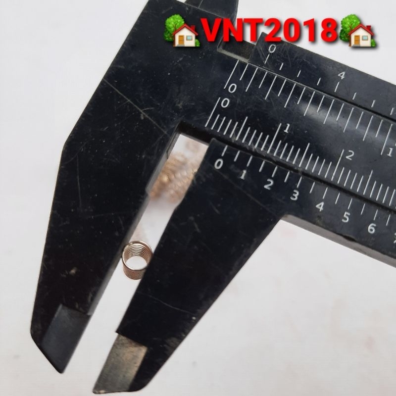 Lò xo nén inox phi 4x14mm